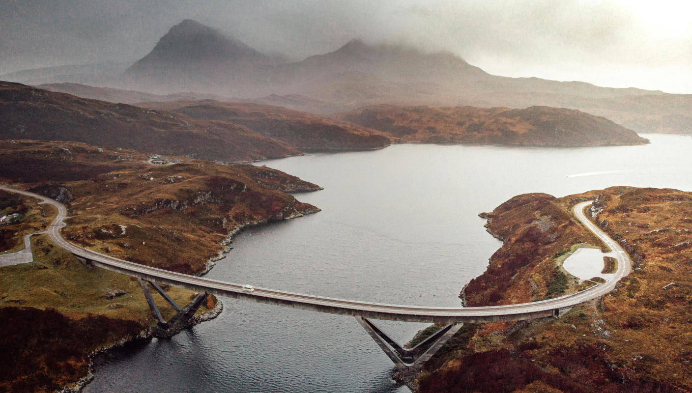 Landscape with a bridge crossing over a river